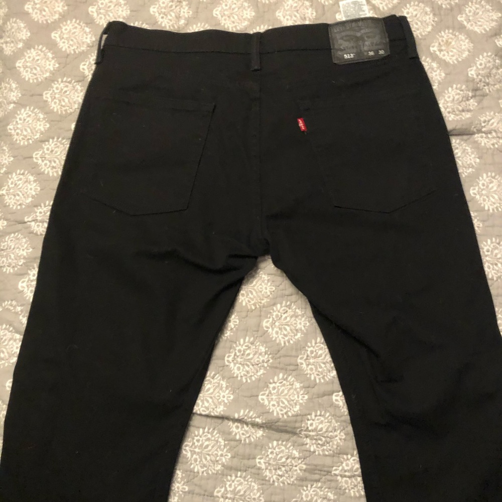 Levi’s 513 jet black jeans